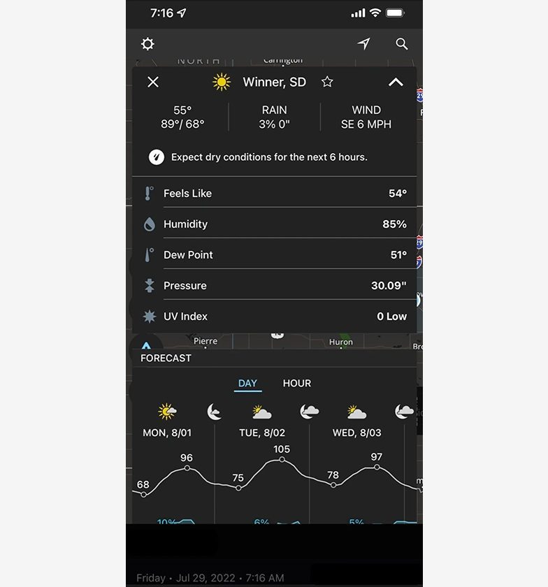 A black phone screen with weather and time zones.