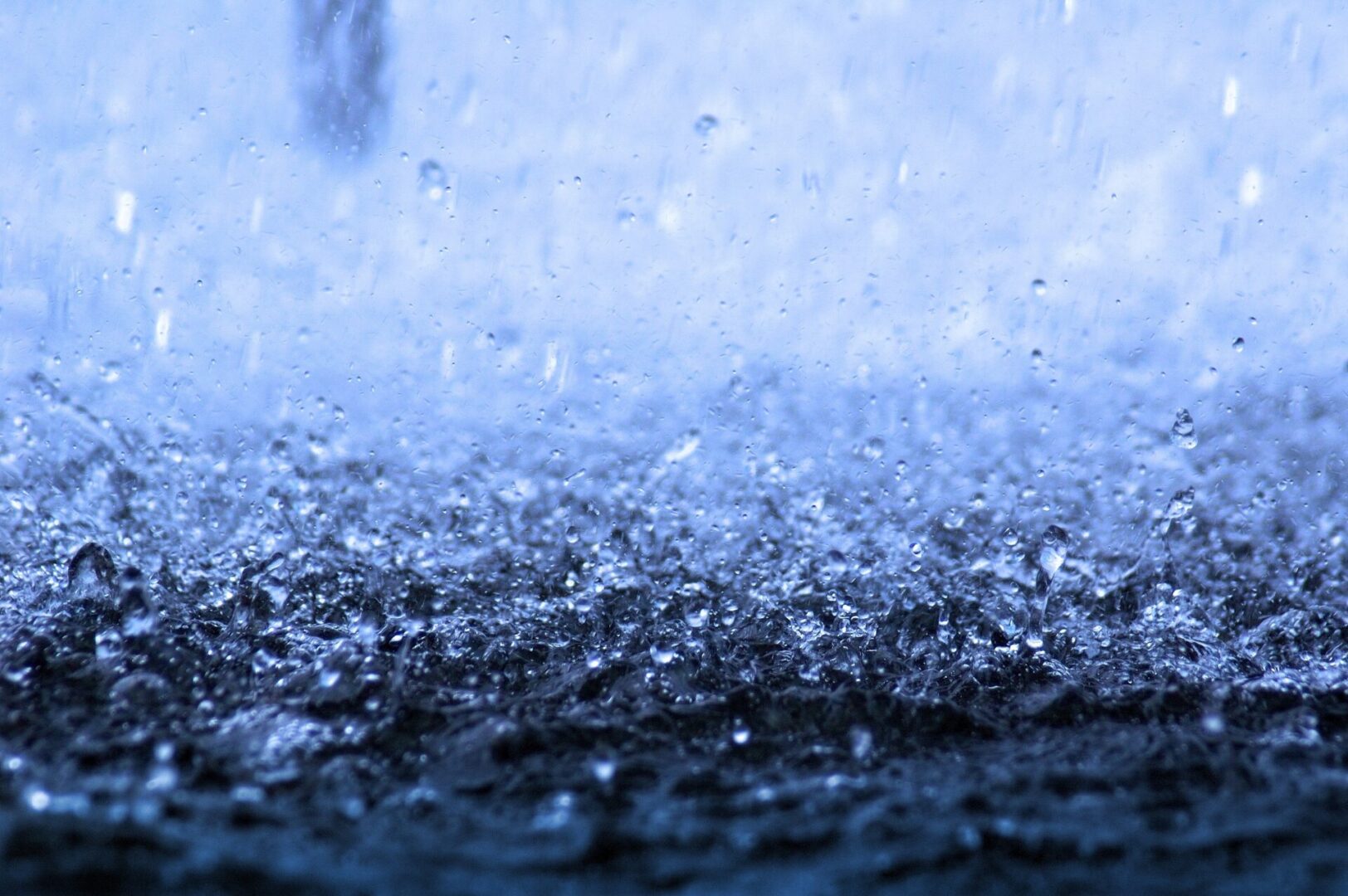 A close up of water pouring on the ground